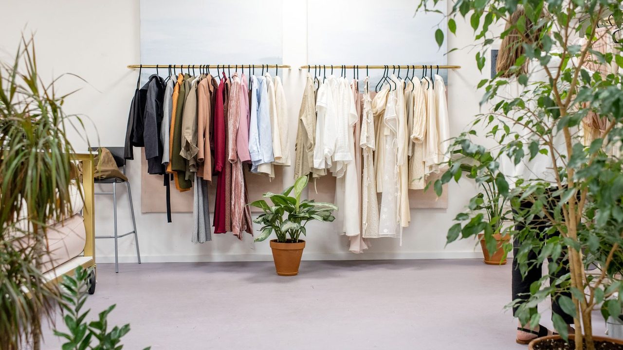 Clothing racks in a light-filled showroom